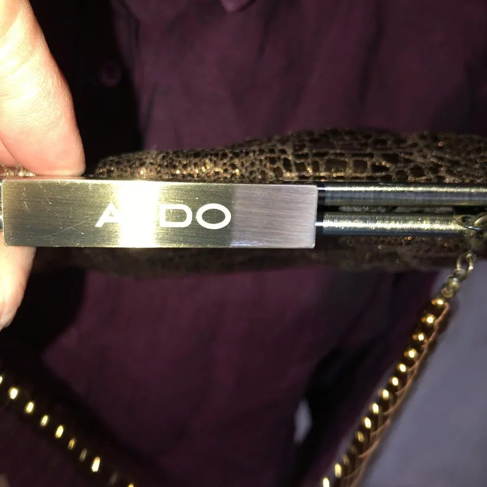 aldo 10x5 Bronze metallic snakeskin clutch